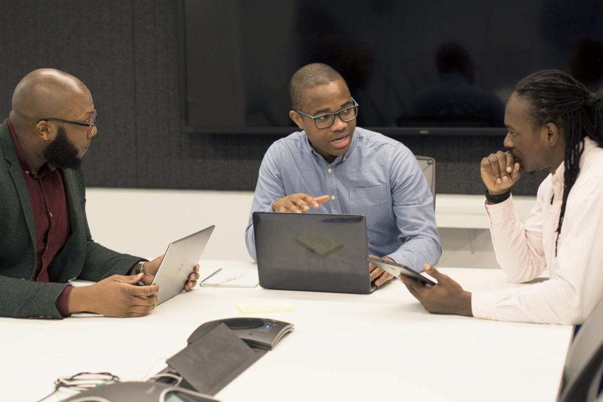 Team collaborating around a table